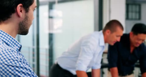 Portrait of business executive smiling in office