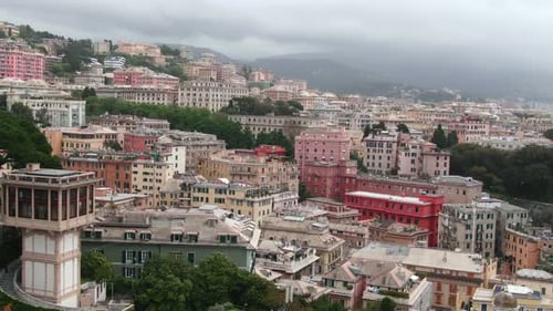 Majestic vibrant cityscape of Genoa, aerial cinematic view