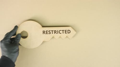 Key Icon with Printed RESTRICTED Text