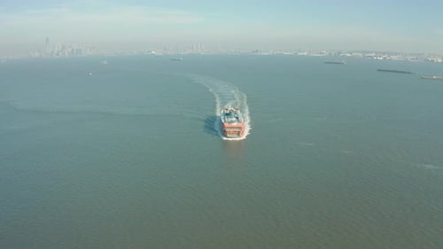 Aerial Drone Shot Tilting Down as Sten Island Ferry Passes Underneath