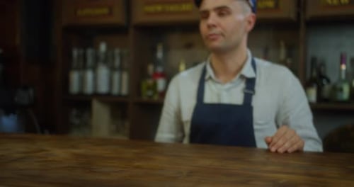 Customer Making Contactless Payment in Store