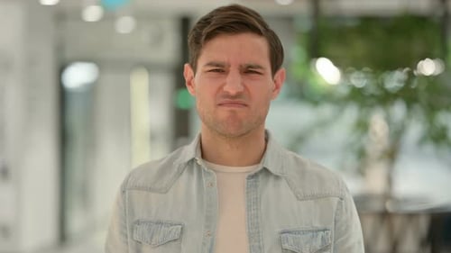 Young Adult Man Talking Close Up
