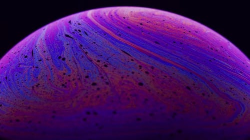 Abstract Planetary Bubble with Flowing Color Patterns