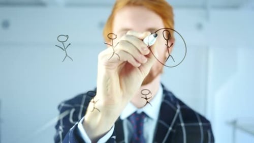Creative Man Drawing People Network Concept on Transparent Glass in Office, Red Hairs