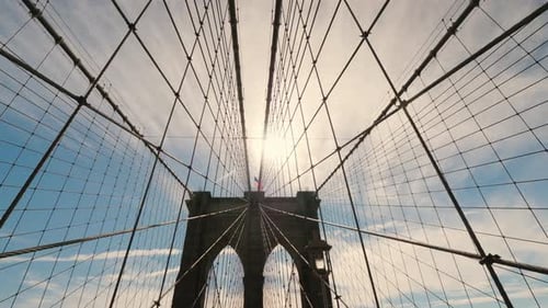 The Silhouette of the Pylons of the Brooklyn Bridge, a Lot of Ropes Hold the Canvas of the Bridge