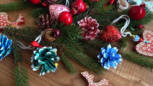 Festive Christmas Ornaments and Evergreen Branches Still Life