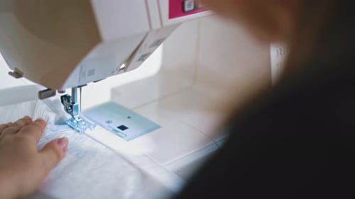 Sewing Machine Stitching White Fabric Close Up