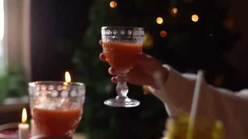 Friends Clinking Glasses for a Christmas Toast