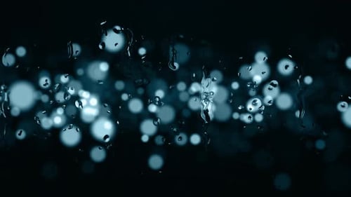 Regentropfen auf einem Glas 01060