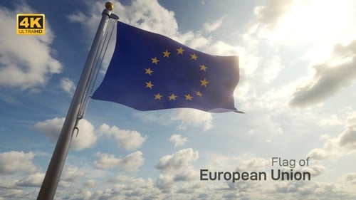 European Union Flag Waving Against Blue Sky with Clouds