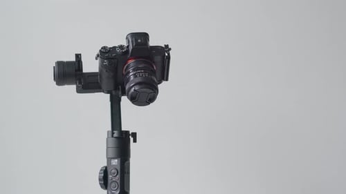 Digital Camera Rotating on a Gimbal Device