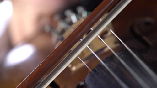 Close Up of Violin Being Played with Bow