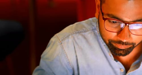 Executive working at desk in office 4k