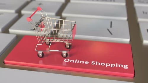 Online Shopping Text on Keyboard and Boxes with DELIVERY Text