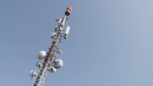 Slow pan antenna system on telecommunication tower 4K 2160p 30fps UHD footage - Base station for mo