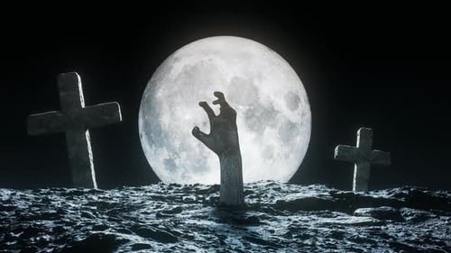 Spooky Zombie Hand Rises from Grave Under Full Moon