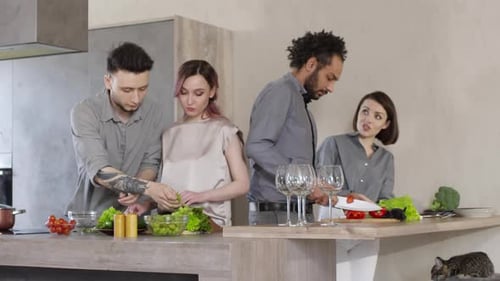 Friends Cooking Healthy Meal Together at Home