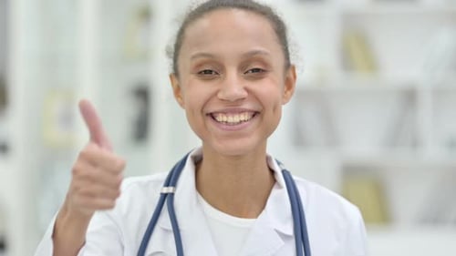 Female Doctor Gives Thumbs Up Approval
