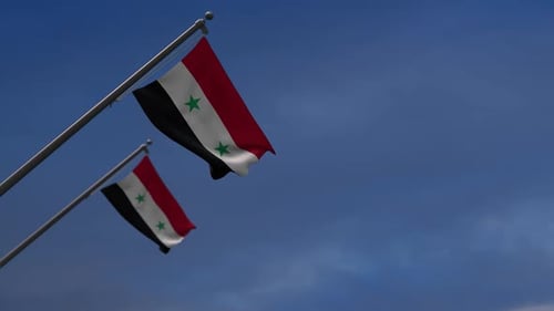 Syrische Flaggen im blauen Himmel - 2K