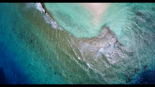 Aerial top down texture of tranquil shore beach holiday by clear ocean and white sandy background of