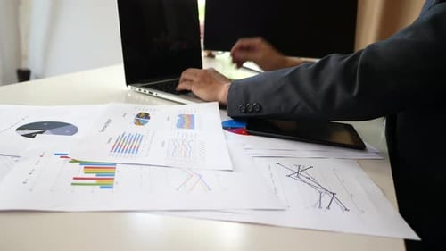 Businessman hands doing analysis planning business project in office.