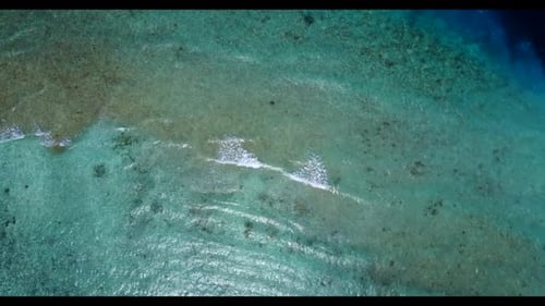 Aerial drone panorama of tranquil lagoon beach holiday by blue lagoon and white sand background of a