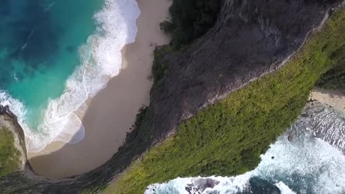 Calmer aerial view flight drone shot from above Untouched nature big waves
Kelingking Beach at Nusa
