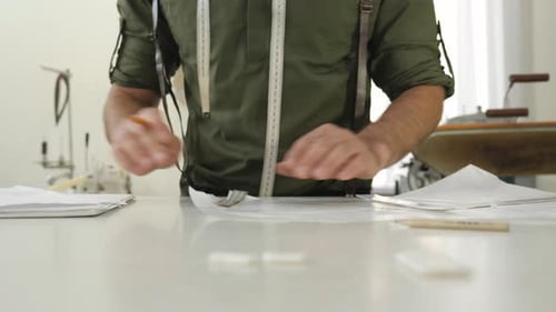 Tailor making a pattern