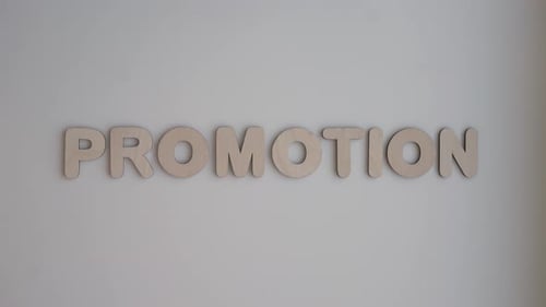 Wooden Letters Spell Out Word "Promotion"