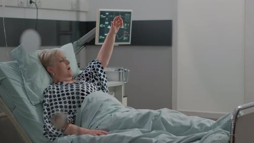 Elderly Woman Receives Emergency Medical Care in Hospital