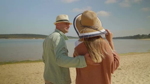 Happy Couple Embracing on Beach