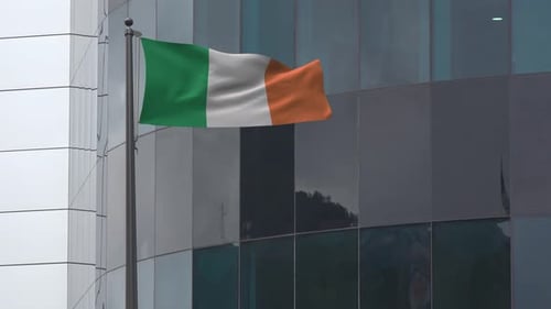 Realistic Waving Ireland Flag on Modern Corporate Building