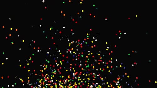 Falling Colorful Balls on Black Abstract Background