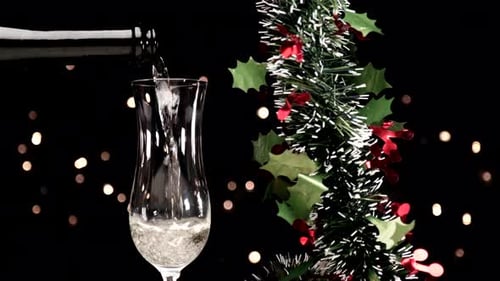 Festive Champagne Pouring in Celebration of Christmas