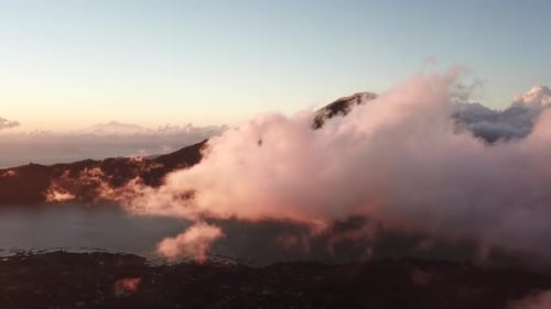 Mountains Appear From the Clouds at Dawn