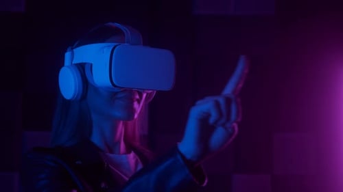 Woman Wearing VR Headset in Dark Room