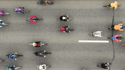 Cyclists Ride Along the Road During the Bike Ride, Aerial View Vertically Down