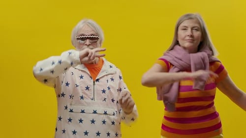 Energetic Seniors Dancing and Celebrating Life's Joys
