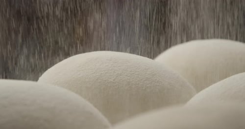 Sifting Flour On Pizza Dough A Closeup Shot With Kitchen On The Background