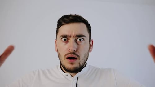 Shocked Man with Wide Eyes and Open Mouth