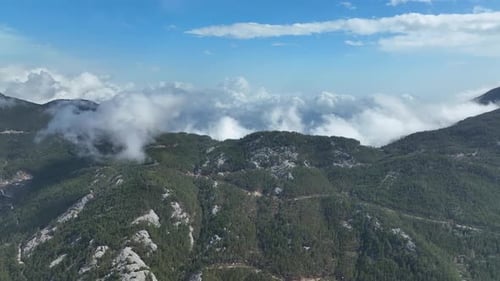 Cloudy landscape high in the mountains aerial view 4 K