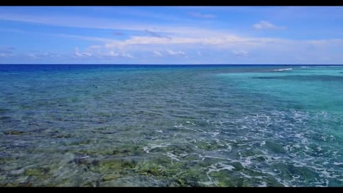 Aerial view panorama of tropical island beach voyage by blue lagoon with bright sandy background of