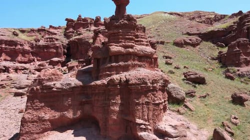 Unique Red Rock Formations in Arid Desert Landscape