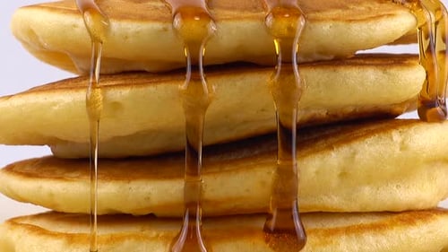 Delicious Stack of Pancakes with Honey Drizzle