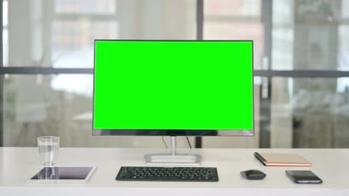 Close Up of Desktop with Green Chroma Key Screen