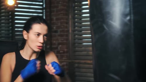 Ferocious Beauty Young Boxing Coach Practice Mixed Martial Arts at Kickbox Studio Closeup
