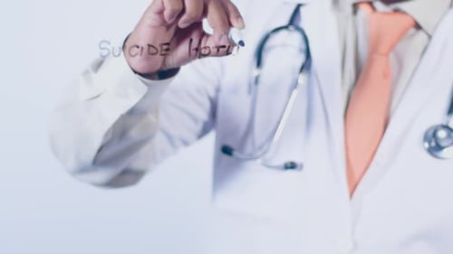 Doctor Writes Suicide Hotline on Glass