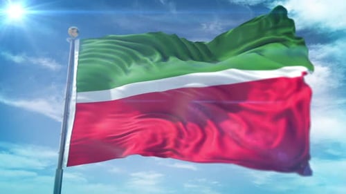 Realistic Waving Flag Against Blue Sky with Sun Flare