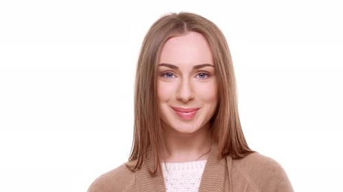 Woman Smiles on a White Background