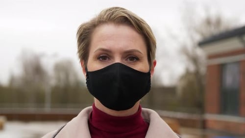 Woman Wearing Protective Reusable Barrier Mask